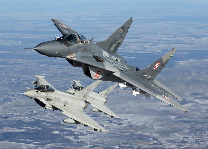 Illustration for article titled These Shots Of Fulcrums and Eurofighters Over Lithuania Are Amazing